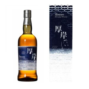 Whisky bottle with a dark blue label beside a matching navy box, both featuring Japanese characters and 'Akkeshi Blended Whisky' design.