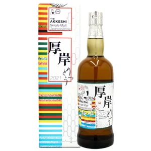 Bottle of THE AKKESHI Single Malt Japanese Whisky with a colorful striped gift box beside it.