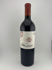 1 お酒買取専門店LIQUORJOYリカージョイ Red wine bottle centered against a light background white label with circular motifs and the script word Almaviva year 2015 visible on label dark glass body