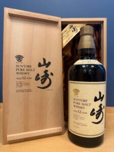 Suntory Pure Malt Whisky bottle aged 12 years in an open wooden gift box with beige label and Japanese characters